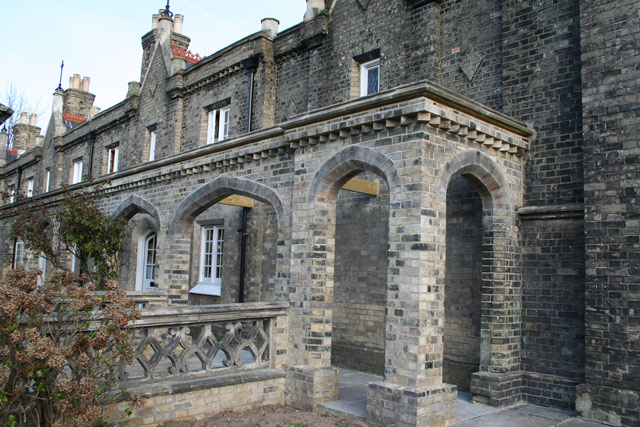 Cloistered colonnades within 19th c almshouses were in danger of collapse